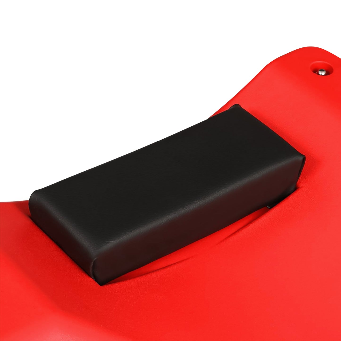 Black rectangular cushion on a red surface